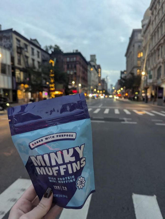 Bag of Minky Muffins on the streets of New York City held in someone's hand